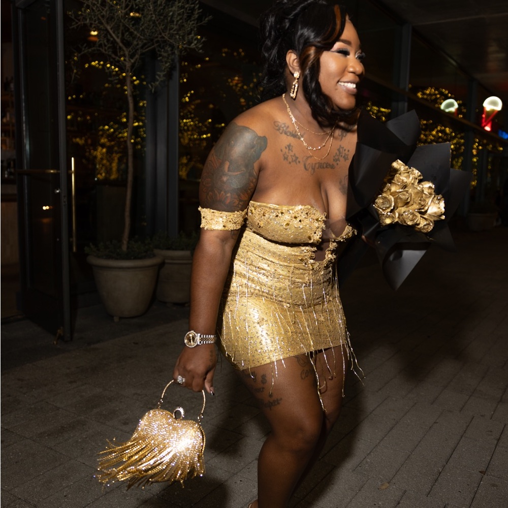 Gold glitter dress .Size large.worn only once.Corset back.Stretchy bottom